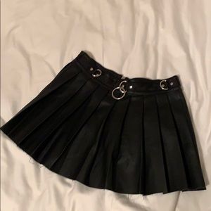 Pleated leather mini skirt from Dolls Kill